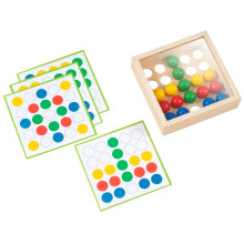 Mosaikbox mit bunten Kringeln