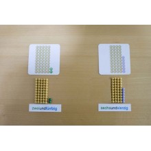 Perlové tyčinky na poli stoviek